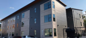 A brand new comtemporary styled apartment building that is located in one of Knoxville's historic downtown area neighborhoods.