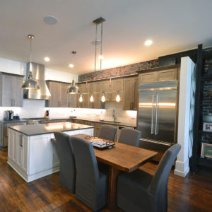 The newly renovates kitchen and dining room of a gay street apartment.