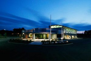 An exterior view of the newly built PIPS Technology office building during the night