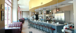 An image of the bar and dining area of the Pete's Coffee Shop after their relocation.