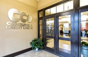 The entry way of the new Consumer Credit Union building as well as the signage.